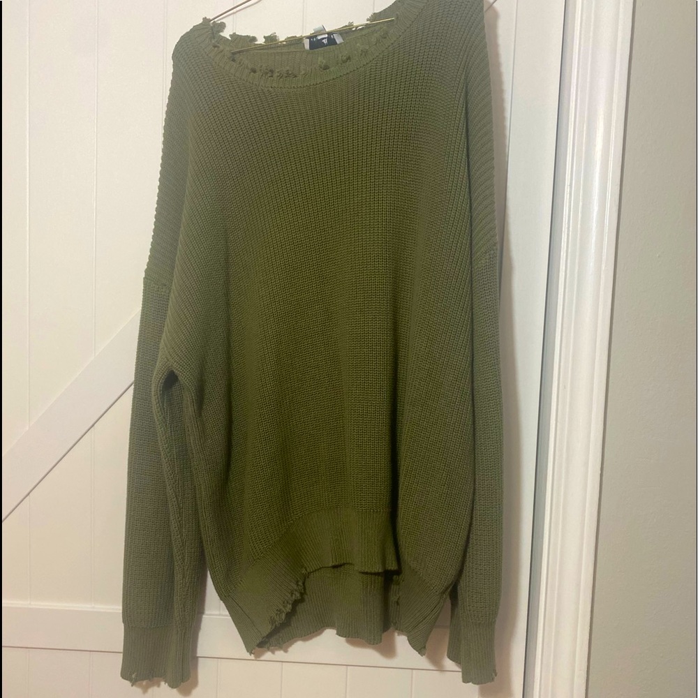 green distressed sweater